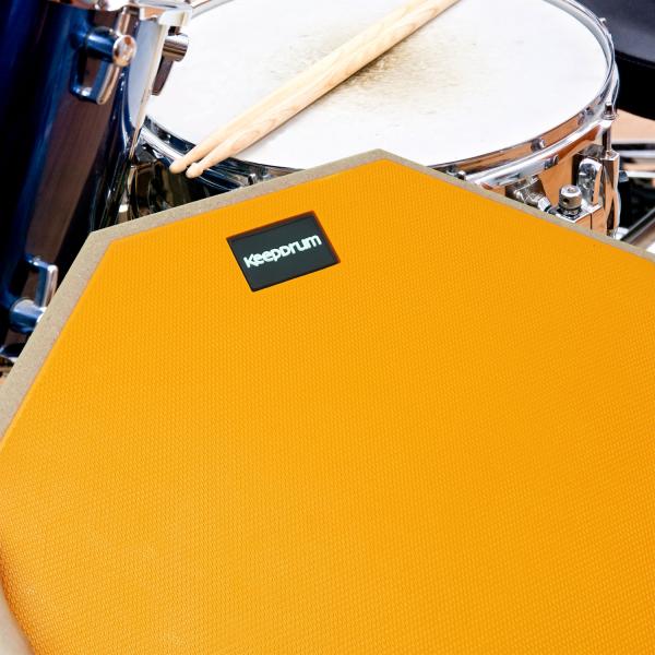 keepdrum Übungspad Orange 12 Zoll mit Schlagzeugstöcken
