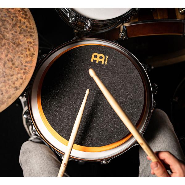 Meinl Practice Pad MMP12OR 12 Zoll mit Schlagzeugstöcken 1 Paar